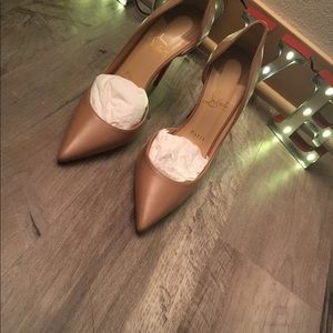 CHRISTIAN LOUBOUTIN “pointy toe” pumps